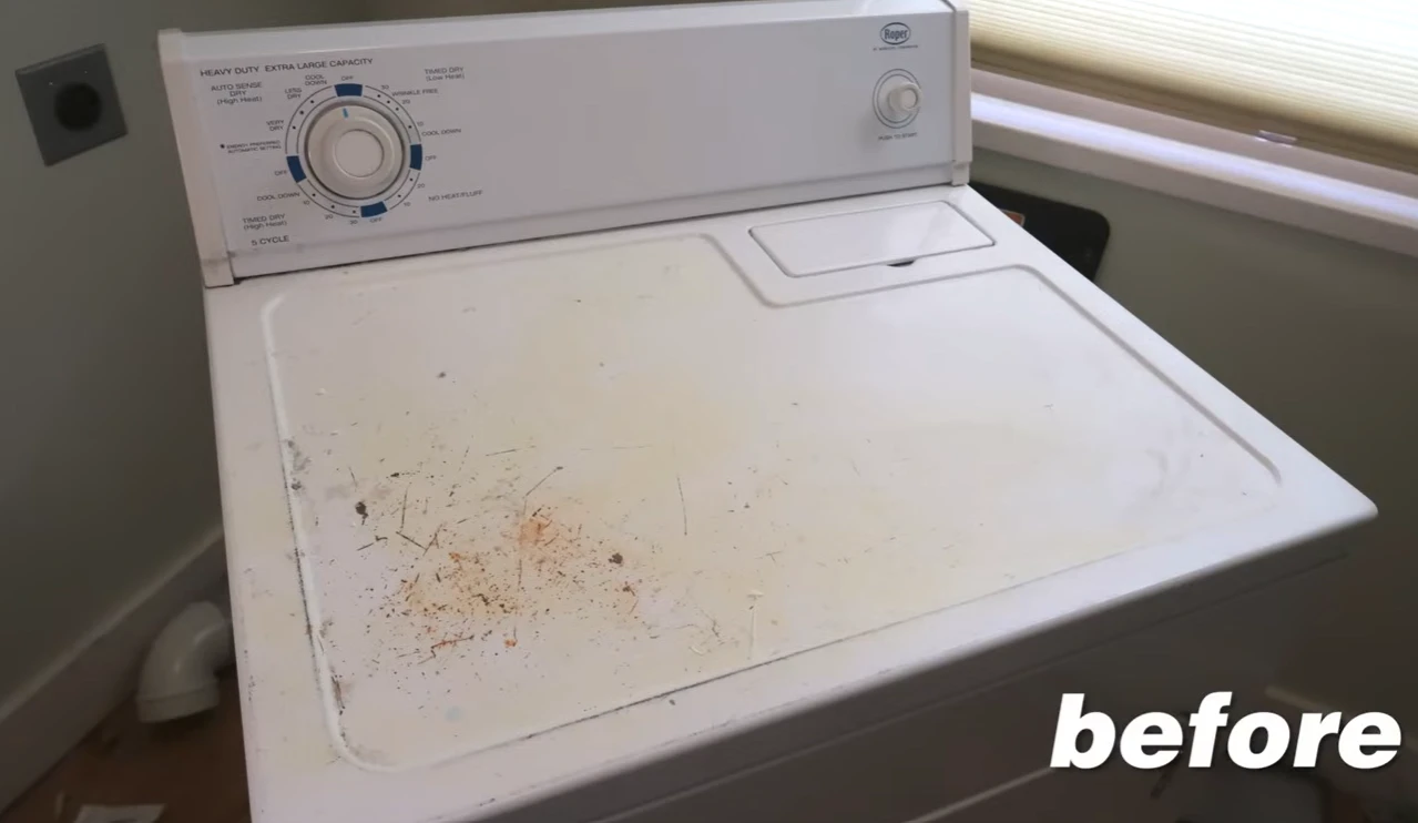 Dryer repair Plano before service: white dryer top covered in stains and grime